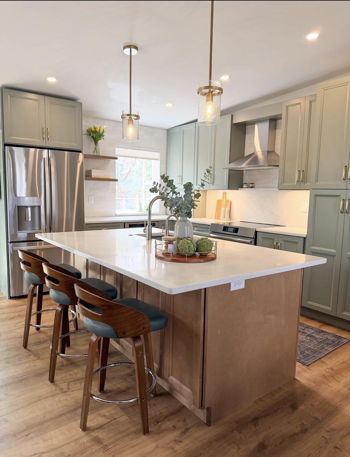 GNZ Construction kitchen remodel with custom island, cabinetry, and pendant lighting